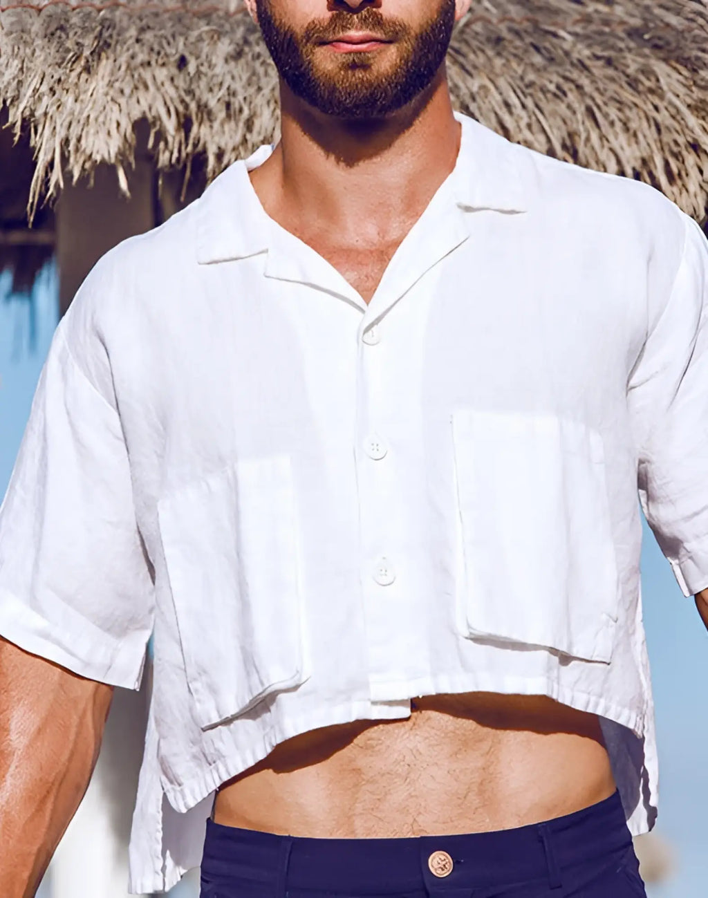 White linen short-sleeved button-up shirt with two front pockets from 2EROS cropped linen shirt collection