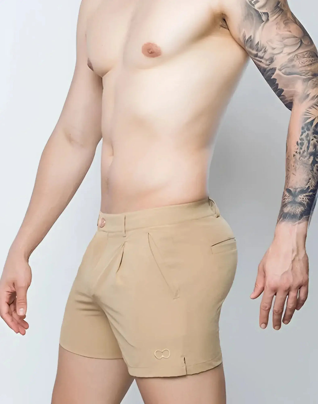 Beige 2EROS Hamilton shorts with subtle textured fabric and small embroidered logo on lower left leg in hazelnut color
