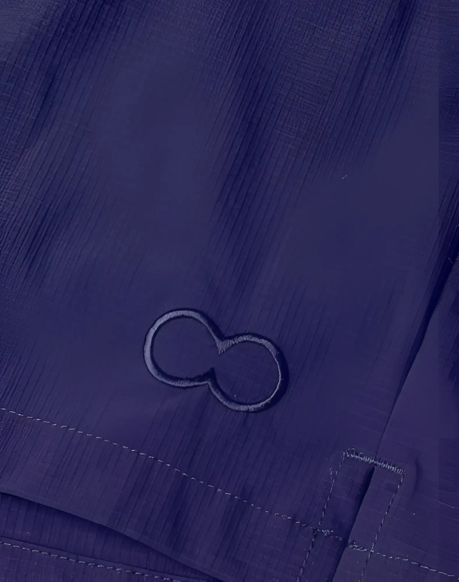 Deep navy blue 2eros hamilton shorts with subtle embroidered infinity symbol logo for casual wear
