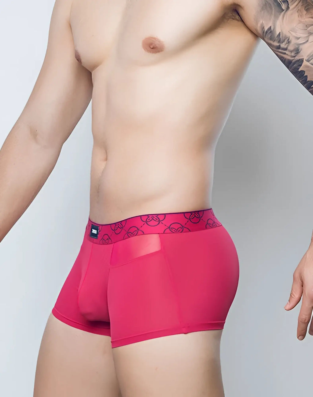 Bright pink 2eros himeros underwear trunk with black skull pattern elastic waistband and left side brand tag