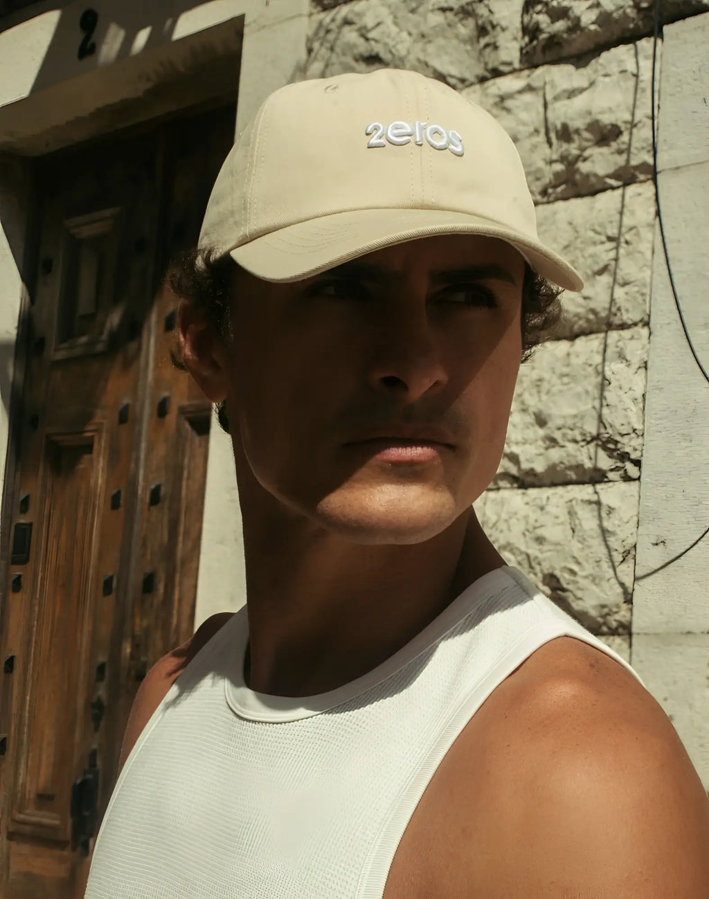 Beige 2eros icon cap featuring embroidered logo on front in a classic baseball cap design