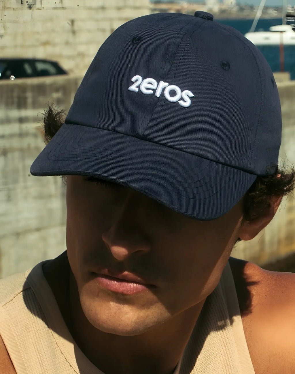 Navy blue 2eros icon cap with white embroidered logo, a stylish baseball cap for casual wear