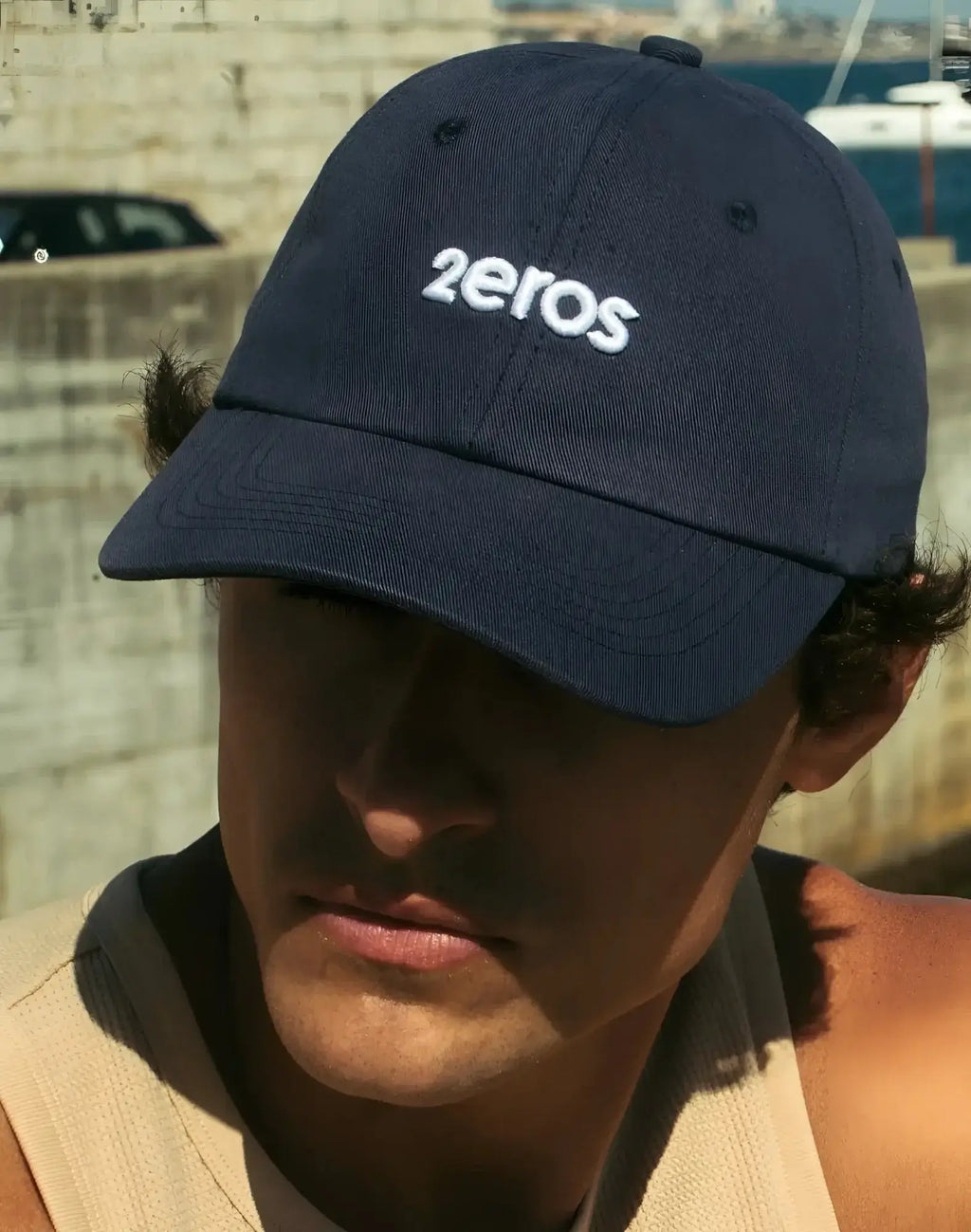 Navy blue 2eros icon cap with white embroidered logo, a stylish baseball cap for casual wear