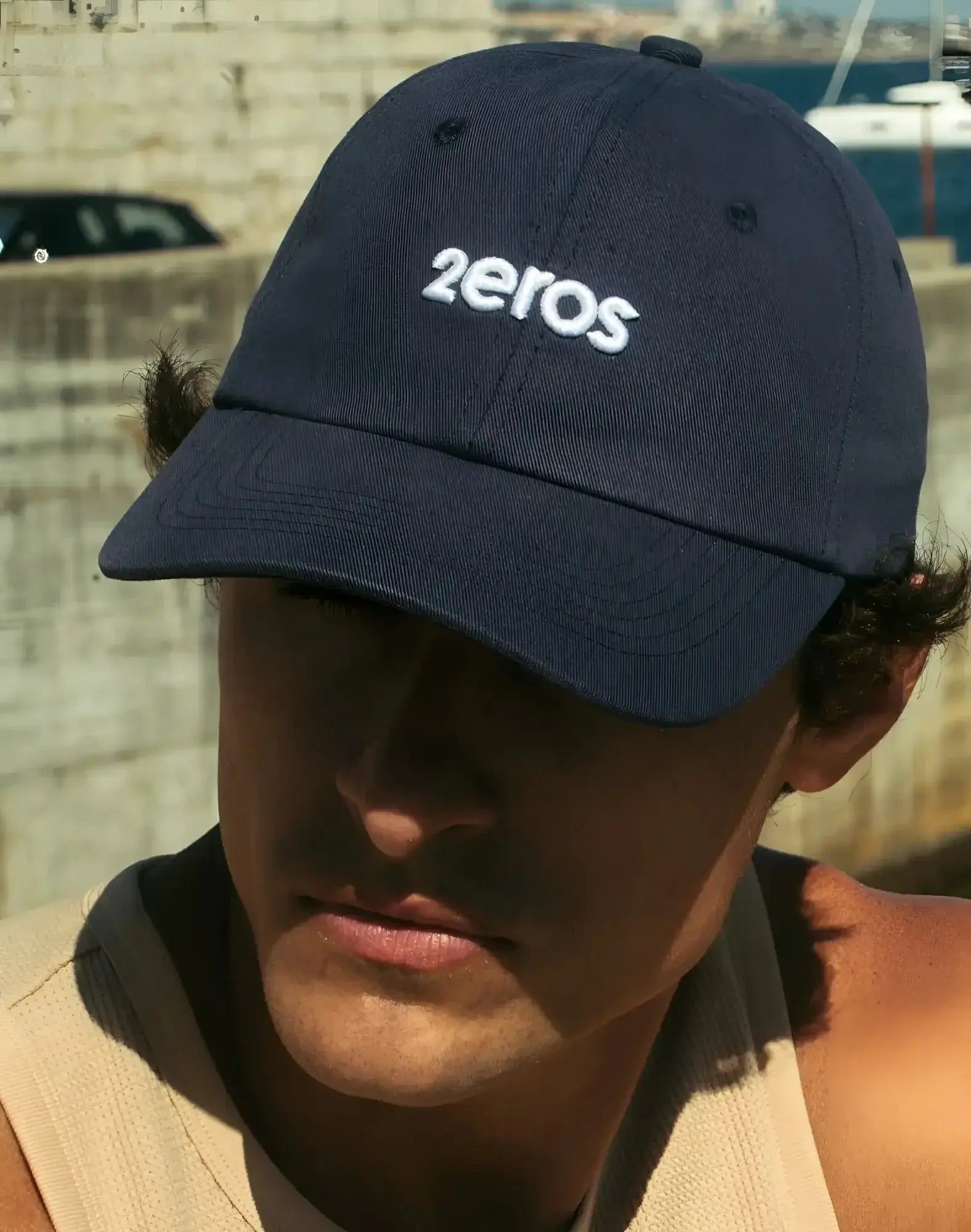 Navy blue 2eros icon cap with white embroidered logo, a stylish baseball cap for casual wear