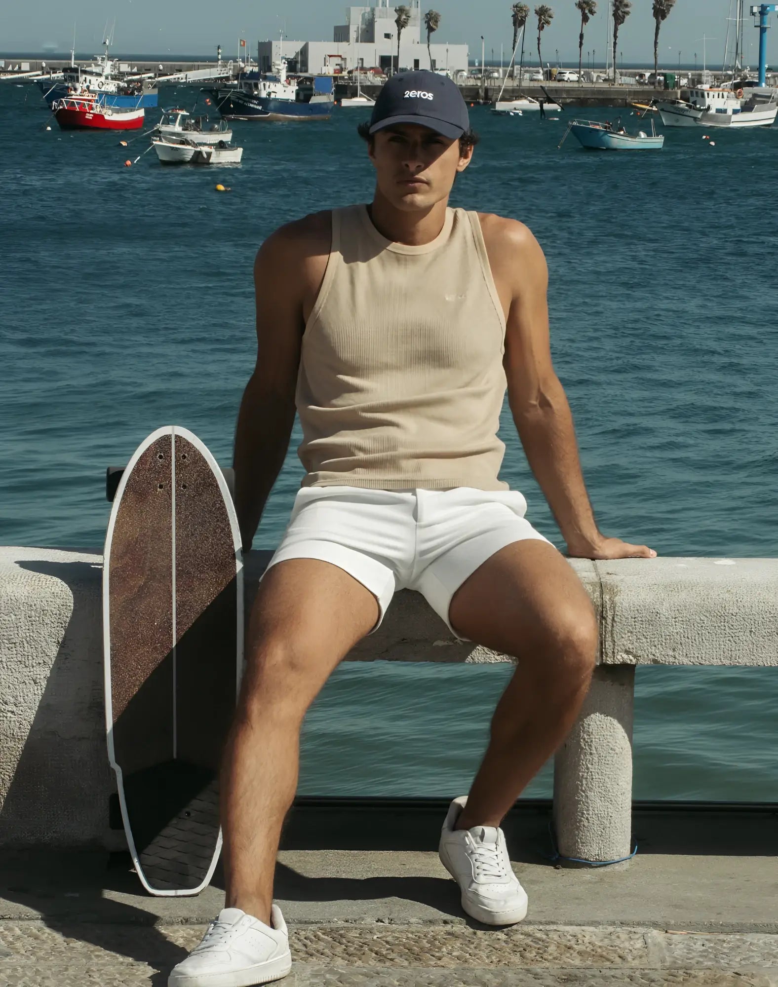 Beige ribbed knit tank top with a small white logo on the chest 2EROS Icon Singlet perfect for casual wear