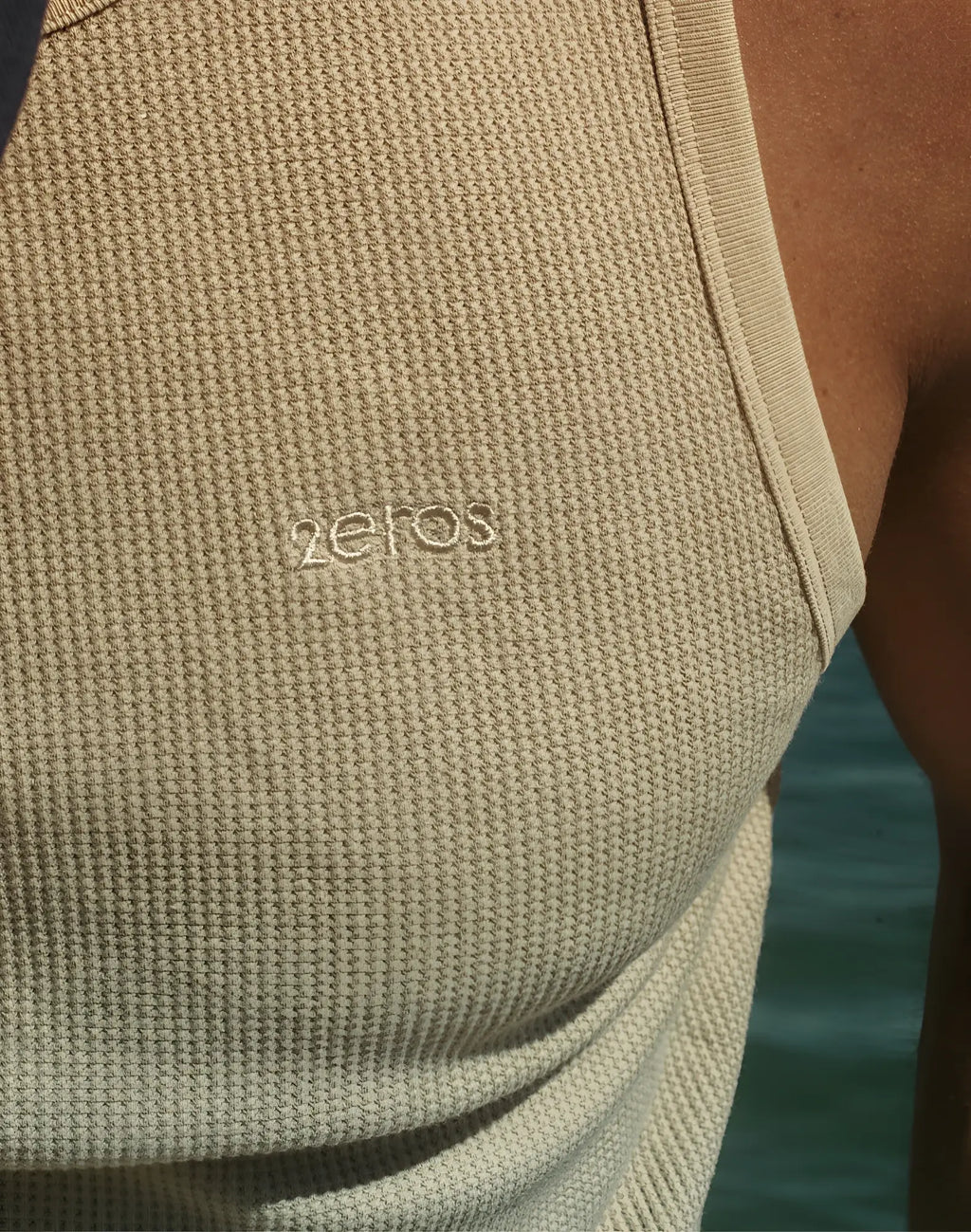 Beige 2EROS icon singlet tank top with textured fabric and subtle zeros embroidery for casual wear