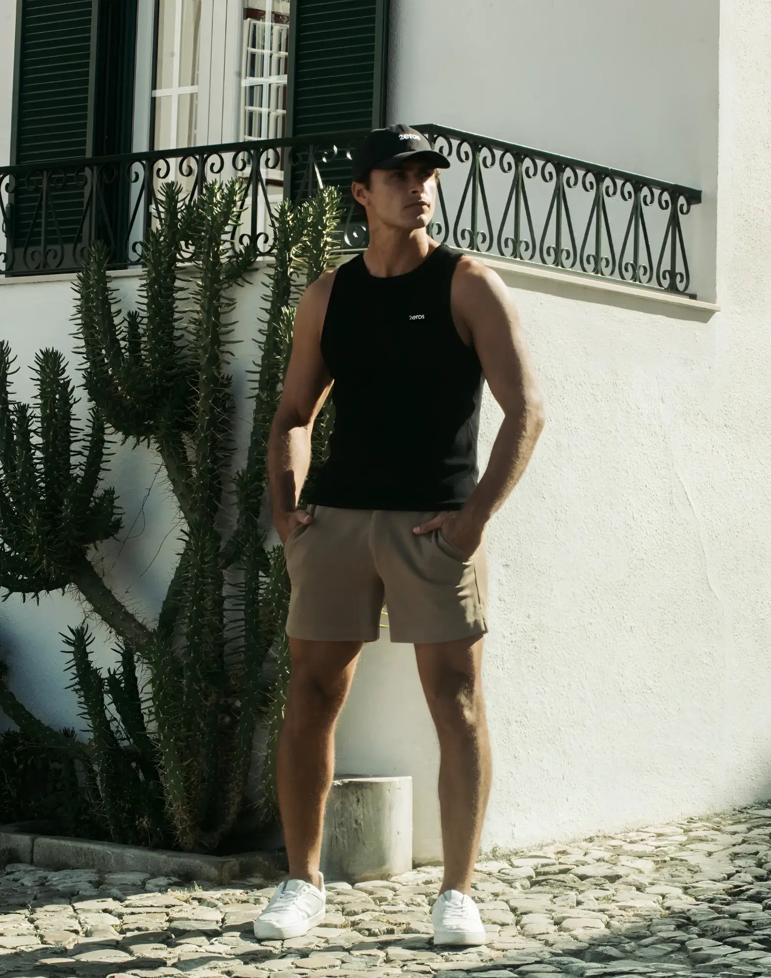 Black sleeveless 2EROS Icon Singlet tank top with a small white logo on the chest for casual wear
