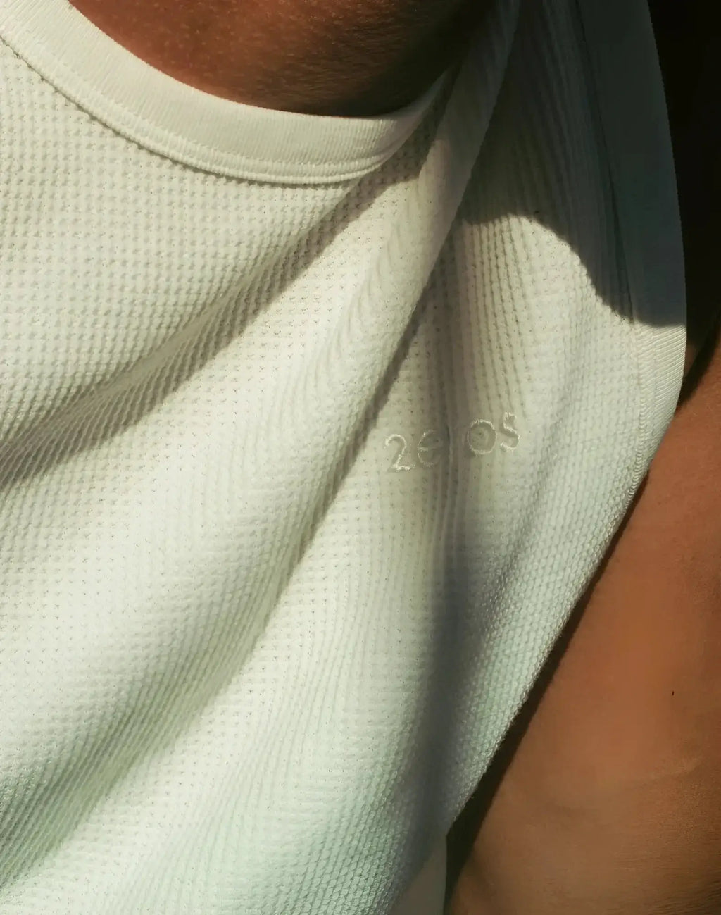 2EROS icon singlet white light green textured mesh t-shirt with subtle 20os logo embroidered on the chest