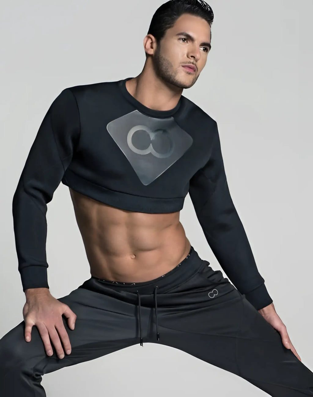Black 2EROS J50 BLK AKTIV short cropped sweatshirt with gray diamond logo featuring interlocking circles on the chest