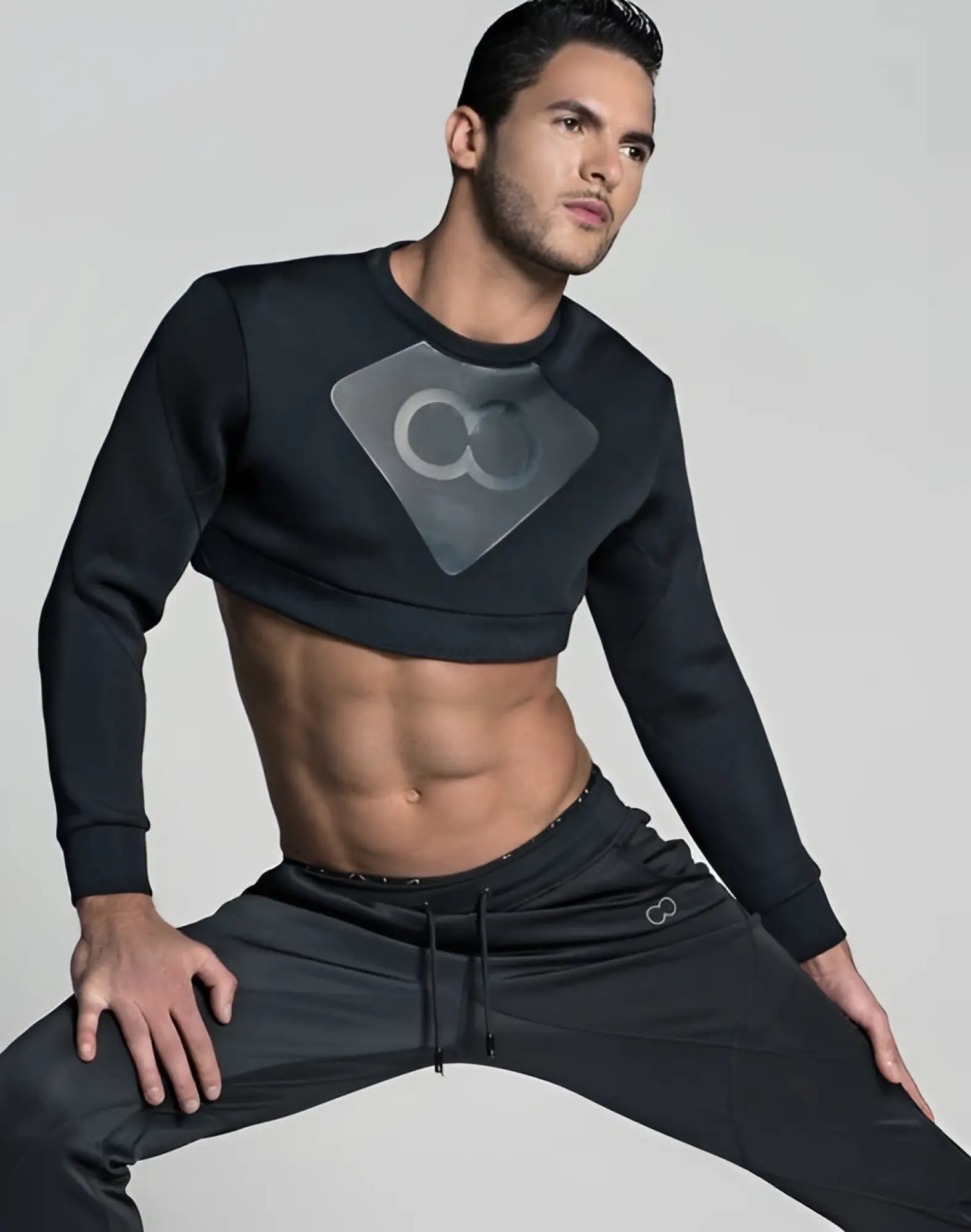 Black 2EROS J50 BLK AKTIV short cropped sweatshirt with gray diamond logo featuring interlocking circles on the chest