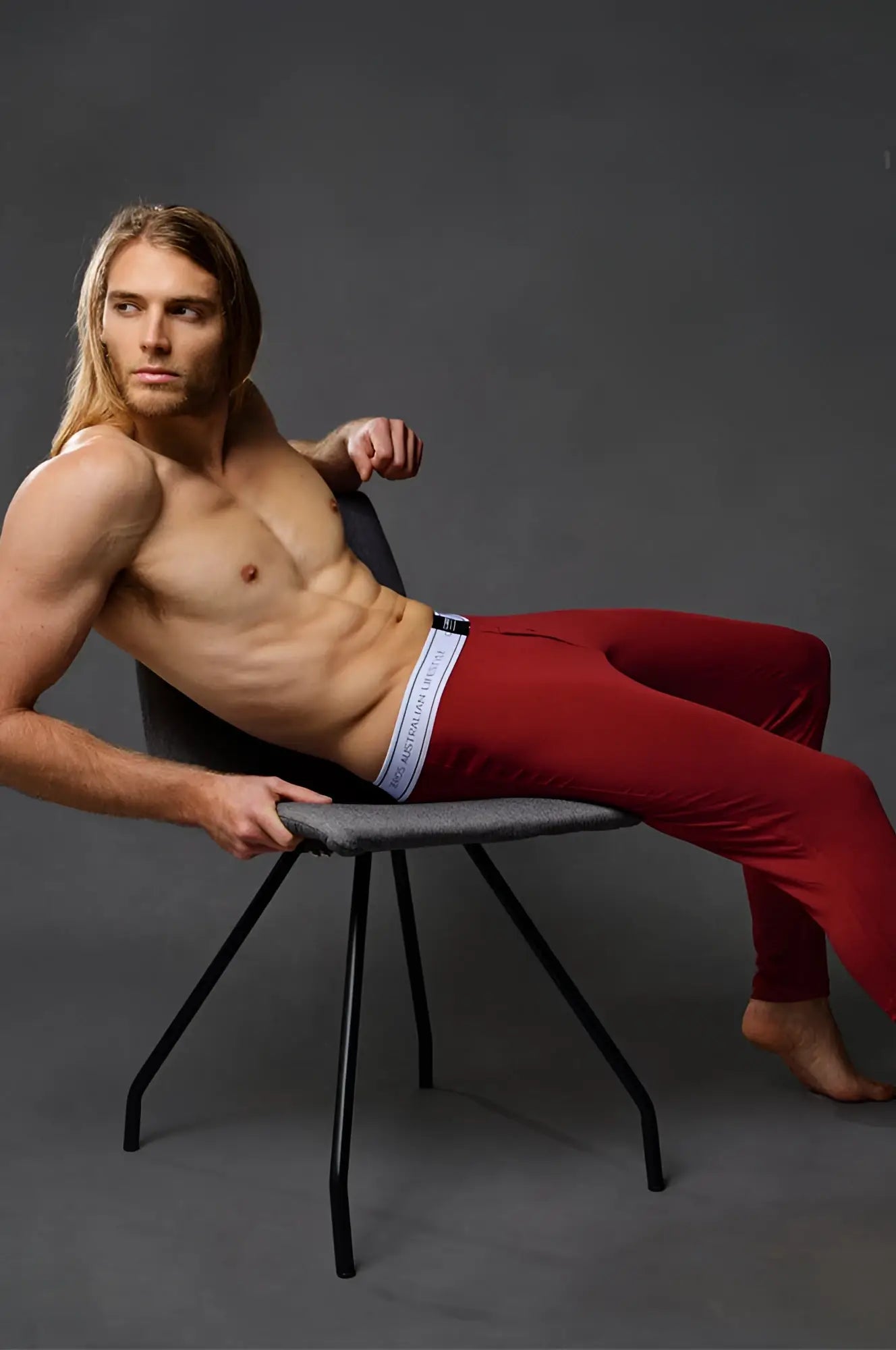Red calvin klein underwear with white waistband shown from the back in 2eros lp10 core lounge pants cabernet color