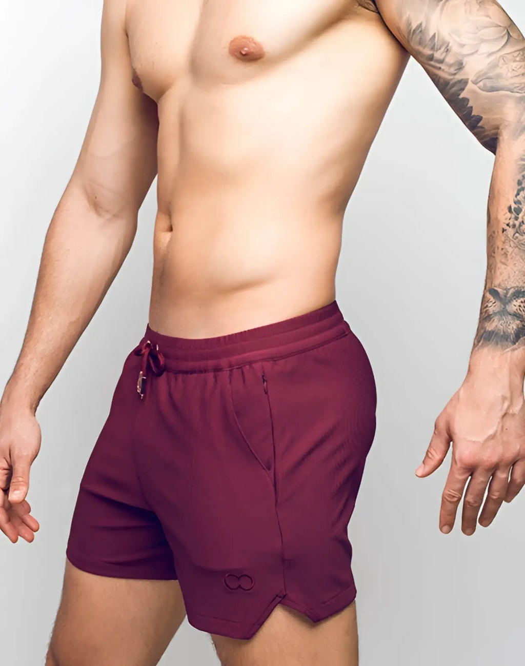 2eros Manly shorts in Tibetan red with a drawstring waistband and subtle ribbed texture designed for athletic use