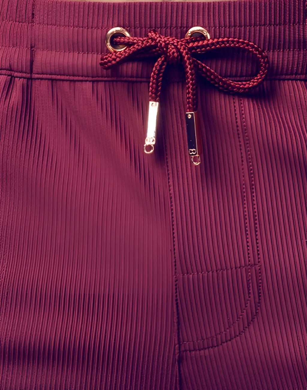 2EROS Manly shorts in maroon corduroy with braided drawstring and metallic toggle ends in Tibetan red color