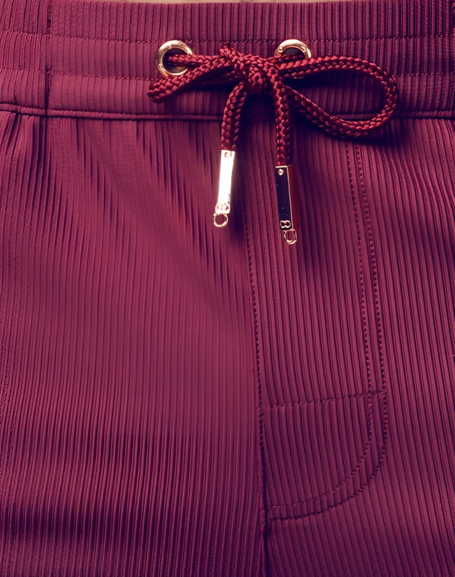 2EROS Manly shorts in maroon corduroy with braided drawstring and metallic toggle ends in Tibetan red color