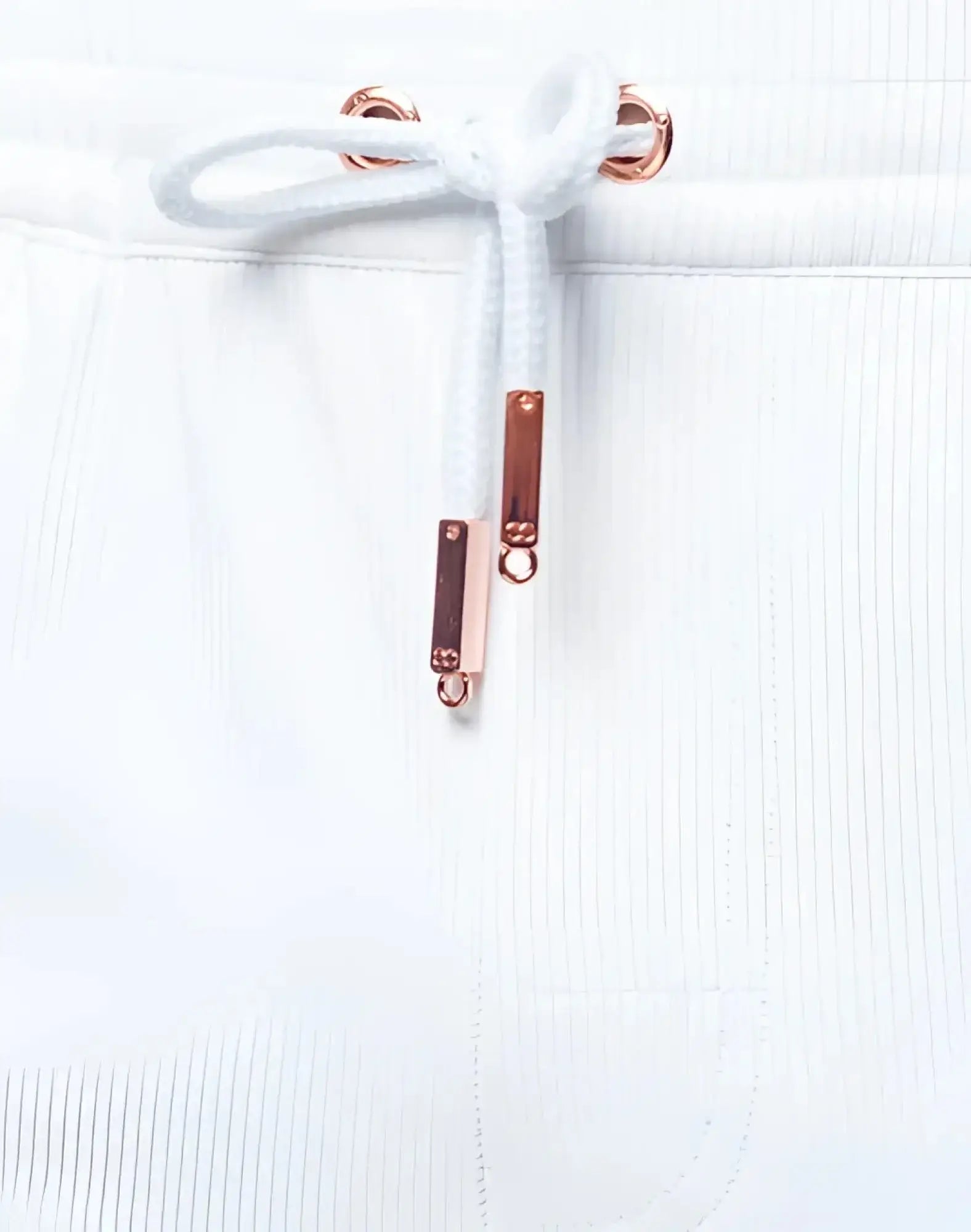 White drawstring with rose gold metal aglets and decorative rectangular sliders on 2EROS Manly Shorts white