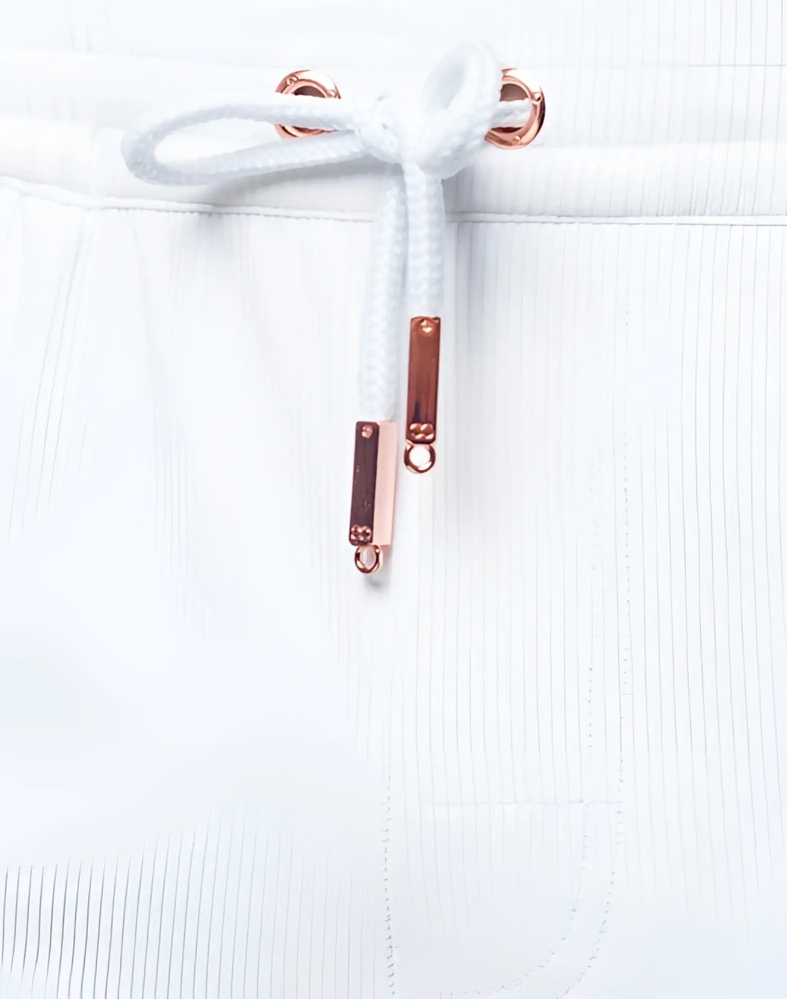 White drawstring with rose gold metal aglets and decorative rectangular sliders on 2EROS Manly Shorts white