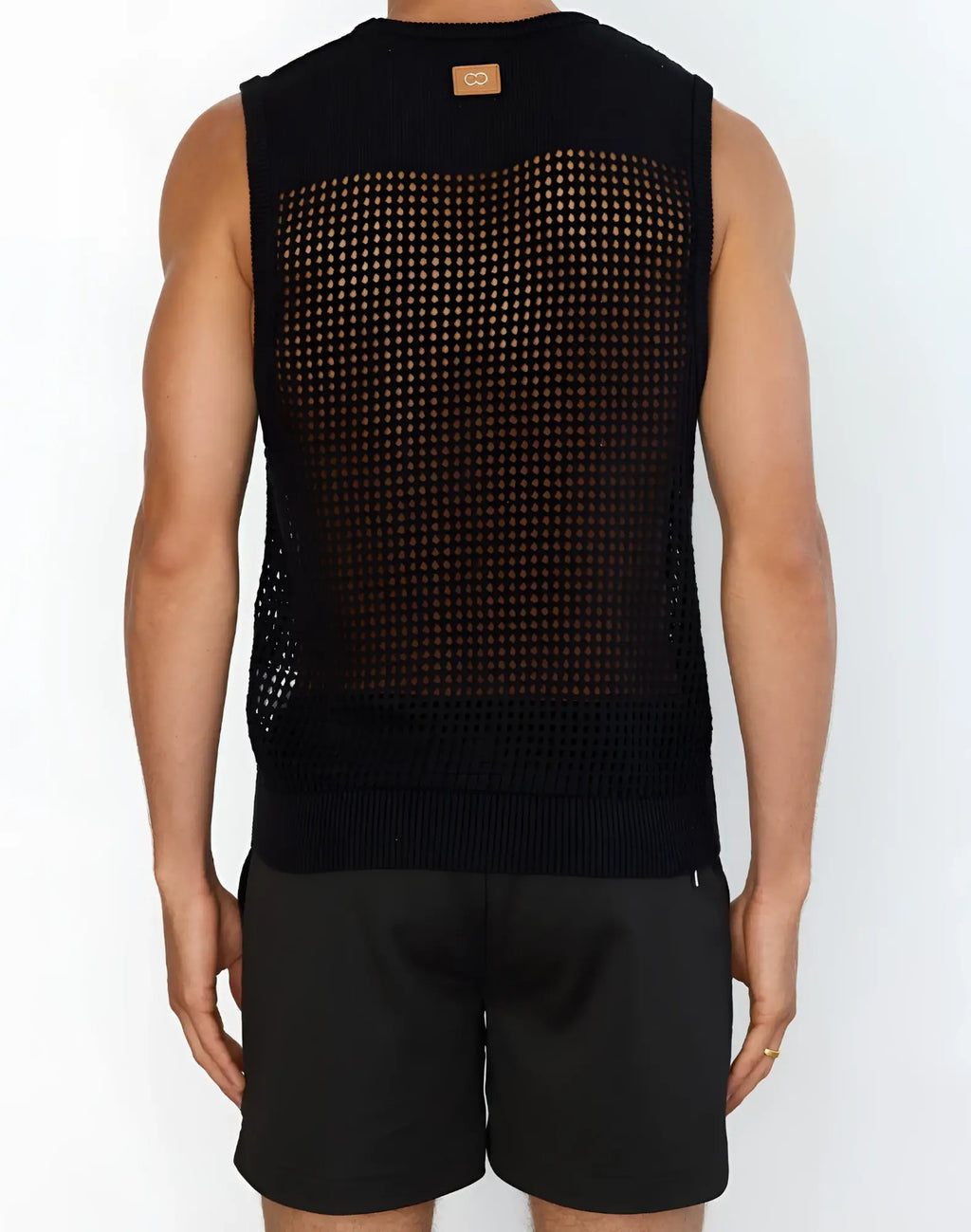 Black mesh knit sleeveless 2EROS Miami singlet with solid ribbed hem and back panel shown from the back side