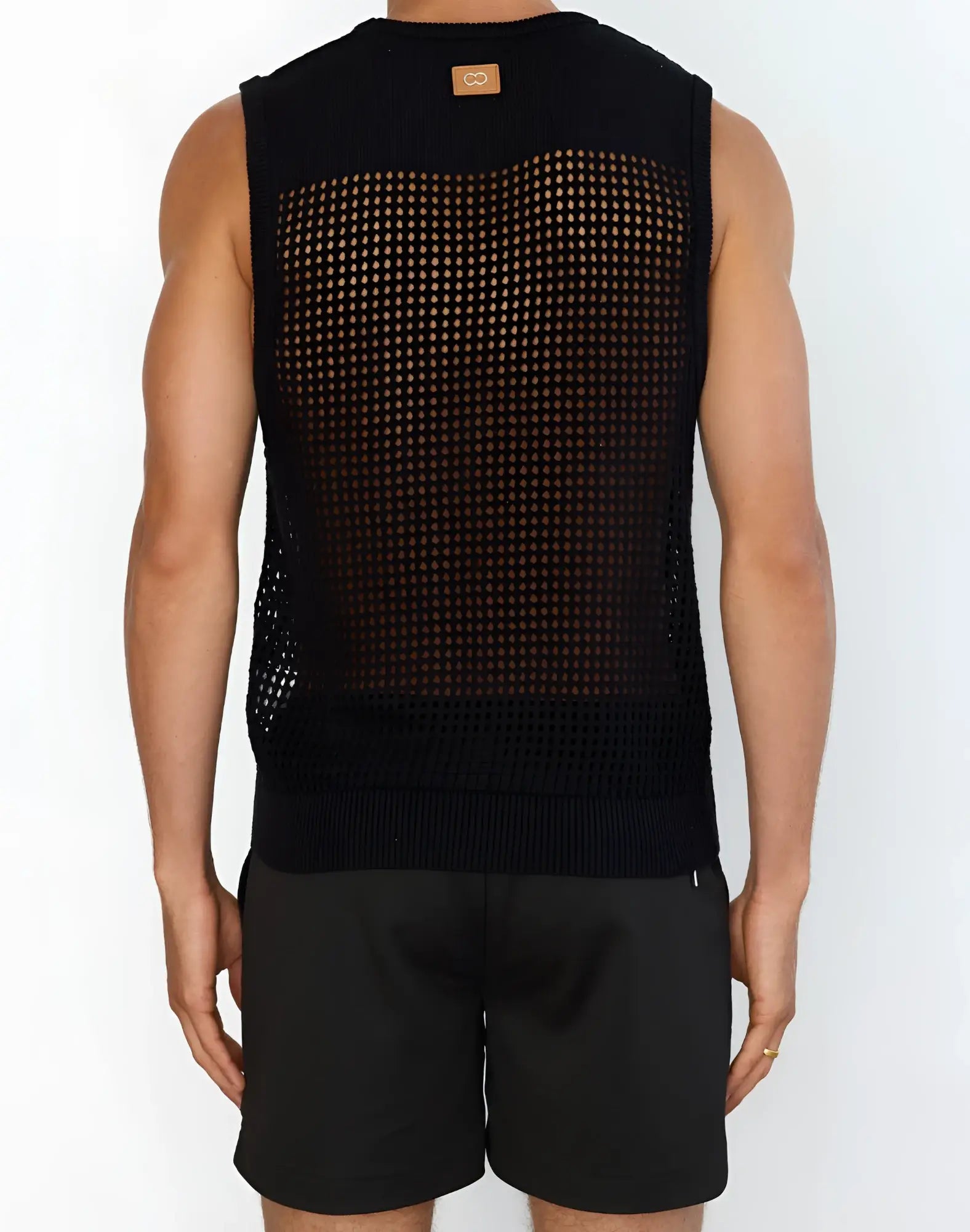 Black mesh knit sleeveless 2EROS Miami singlet with solid ribbed hem and back panel shown from the back side