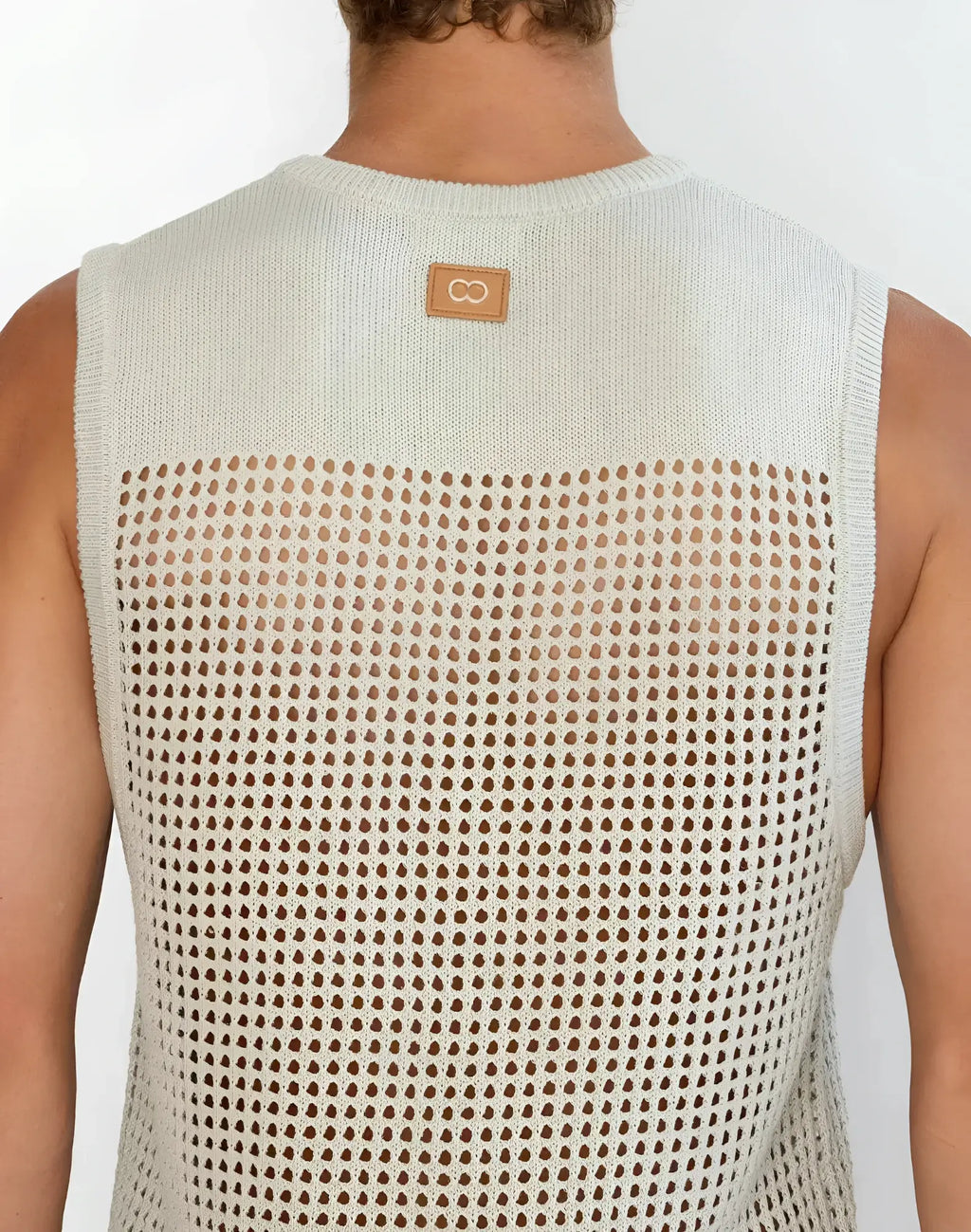 Back view of 2EROS Miami singlet grey light beige knitted sleeveless top with perforated mesh and leather patch