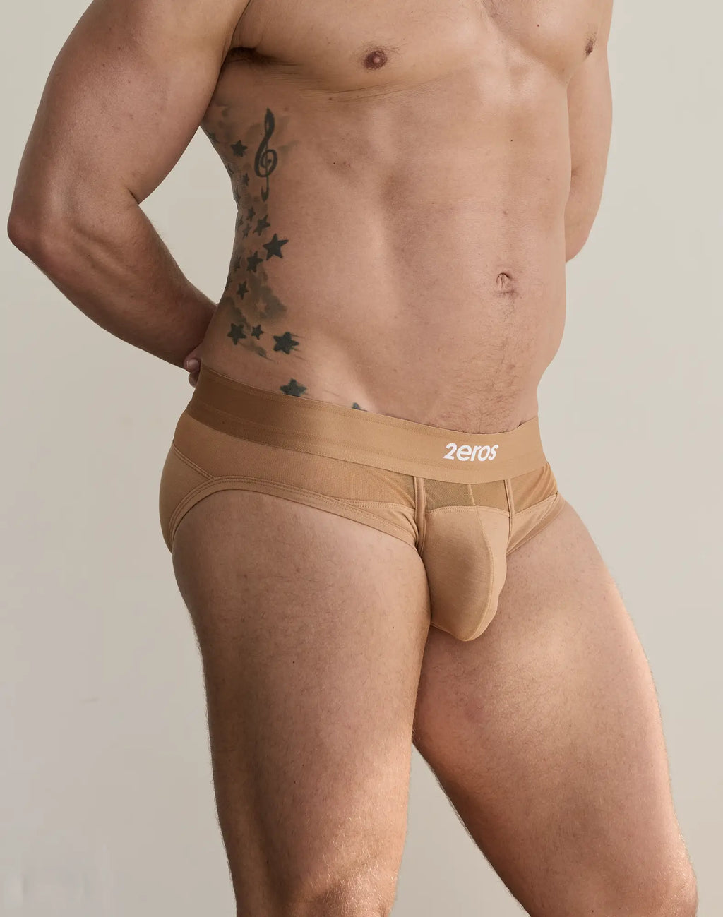 Tan seamless 2EROS Morpheus brief underwear with snug fit and branded waistband for athletic wear