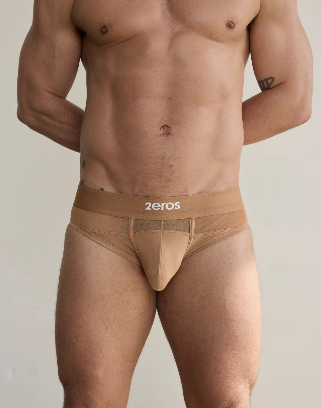 Tan seamless 2eros morpheus brief underwear with mesh panel and logo waistband in brown color front view