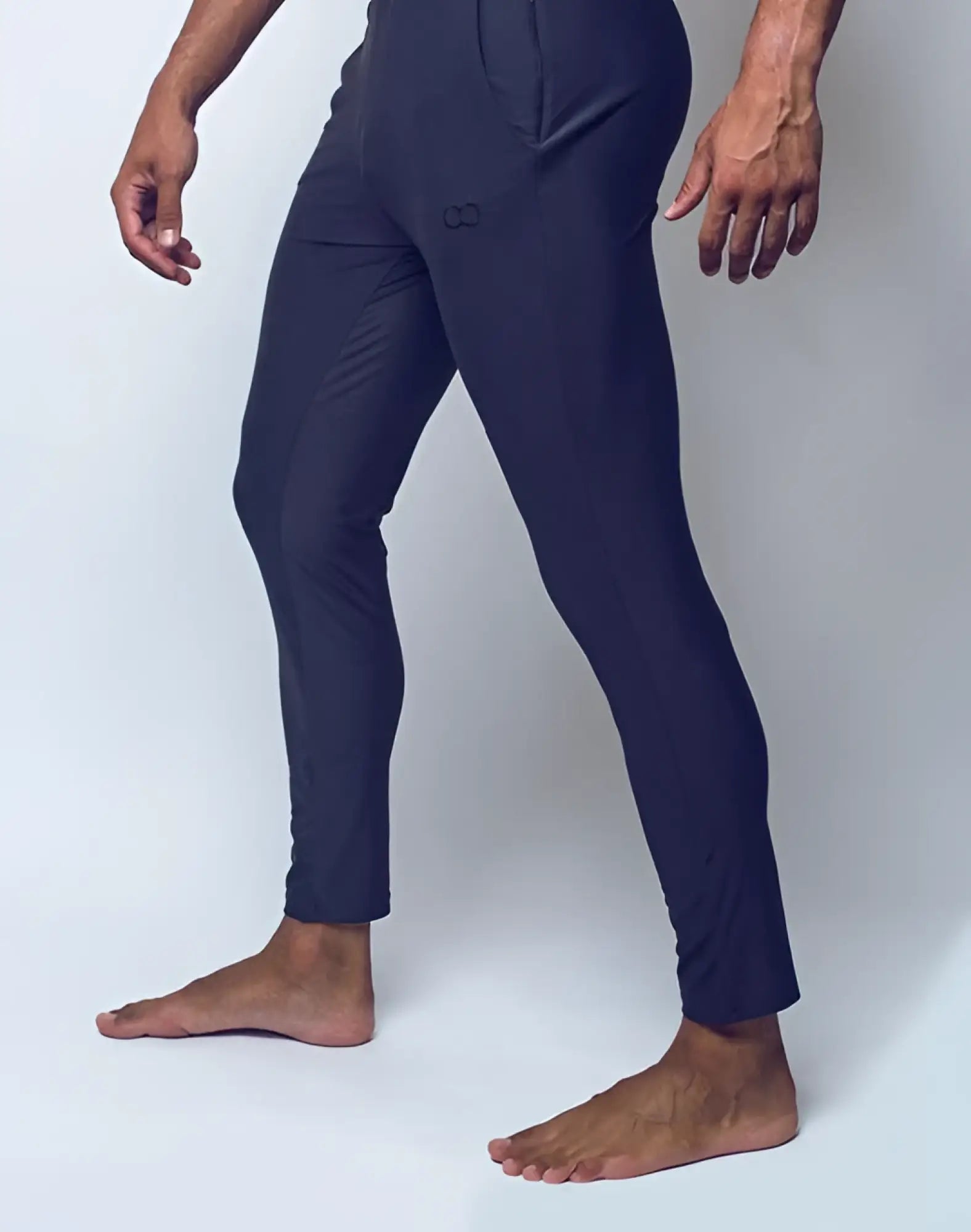Dark navy 2eros p60 bondi athletic pants with sleek form-fitting design and subtle brand logo on the thigh