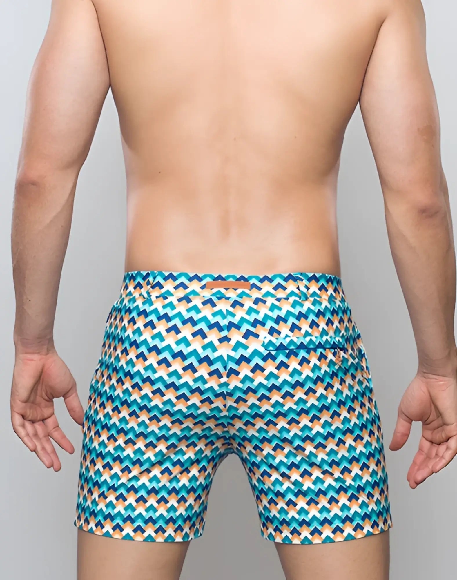 Men’s 2EROS printed Bondi shorts in chevy blue featuring vibrant teal blue and beige geometric zigzag swim trunks