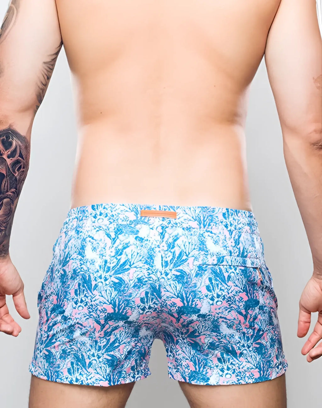 2EROS printed Bronte shorts in coral teal with blue and pink floral swim trunks and a tan fabric waistband