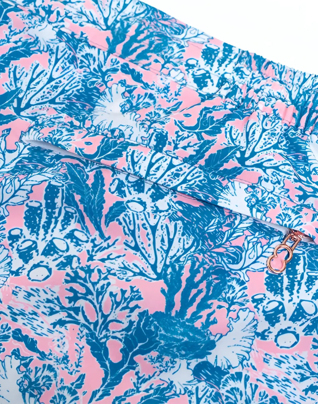 Blue and pink coral-patterned 2EROS printed Bronte swim shorts with a metallic zipper pull in coral teal