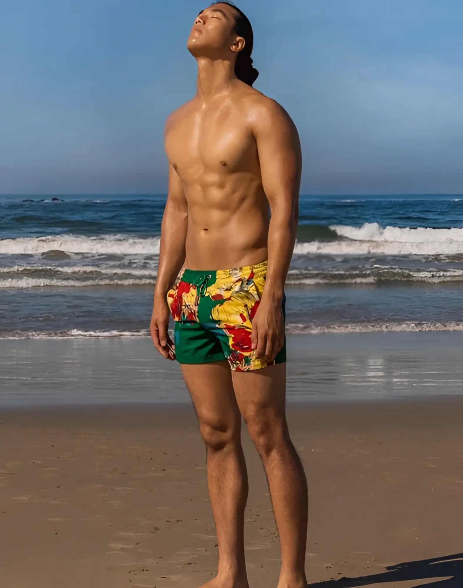 Vibrant 2EROS printed Bronte shorts with green yellow and red floral pattern perfect for swim and beachwear