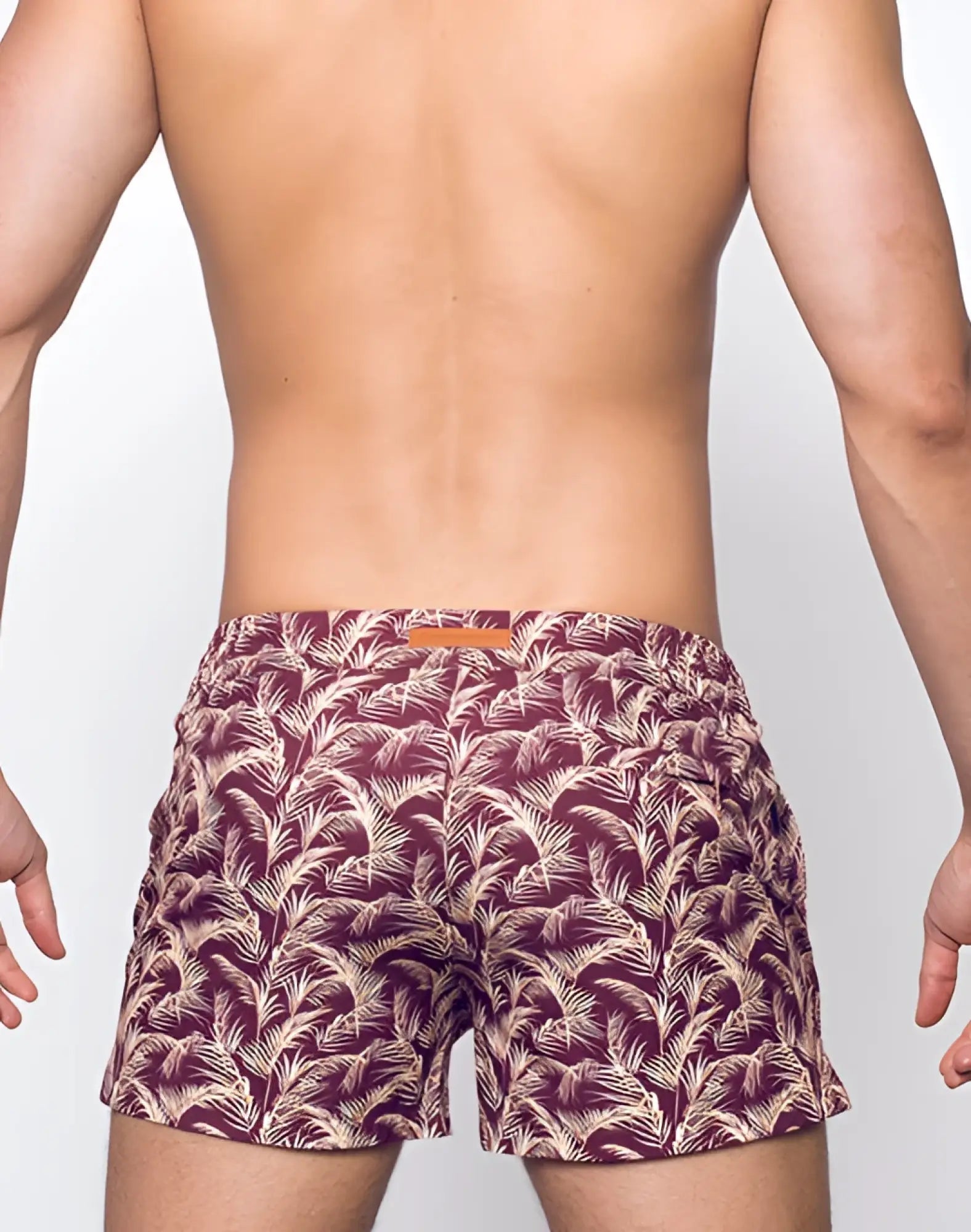 2eros printed bronte shorts in maroon and cream tropical leaf pattern swim trunks for beachwear