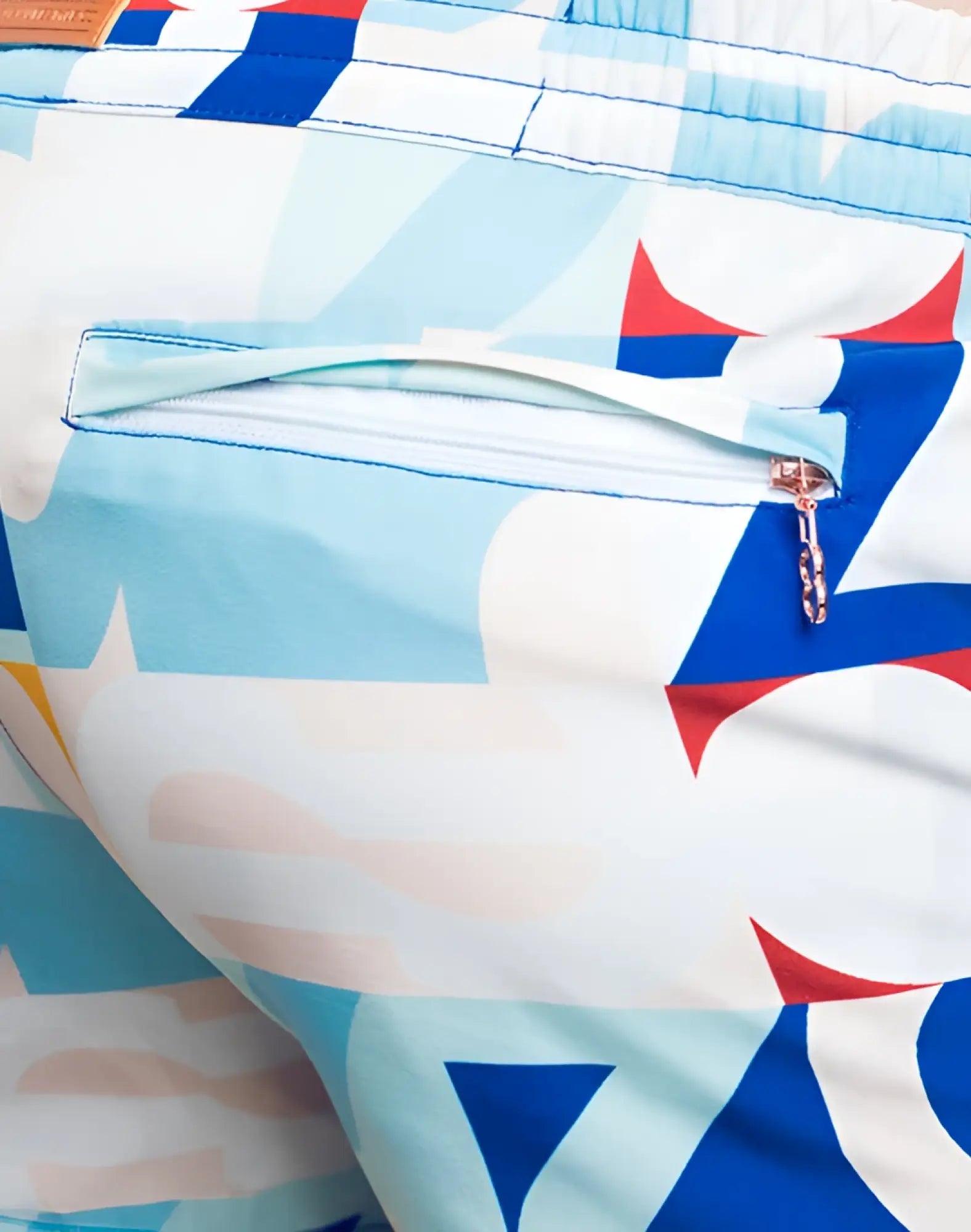 2EROS printed bronte shorts insignia turquoise swim trunks with blue red white geometric pattern and zipper pocket