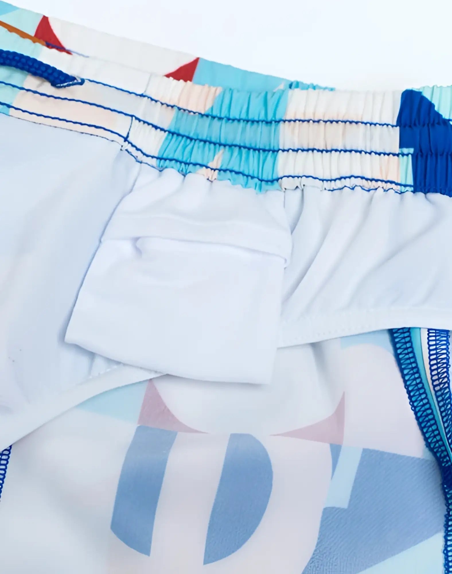 2eros printed bronte shorts in insignia turquoise feature blue and white patterned swim trunks with a drawstring waistband