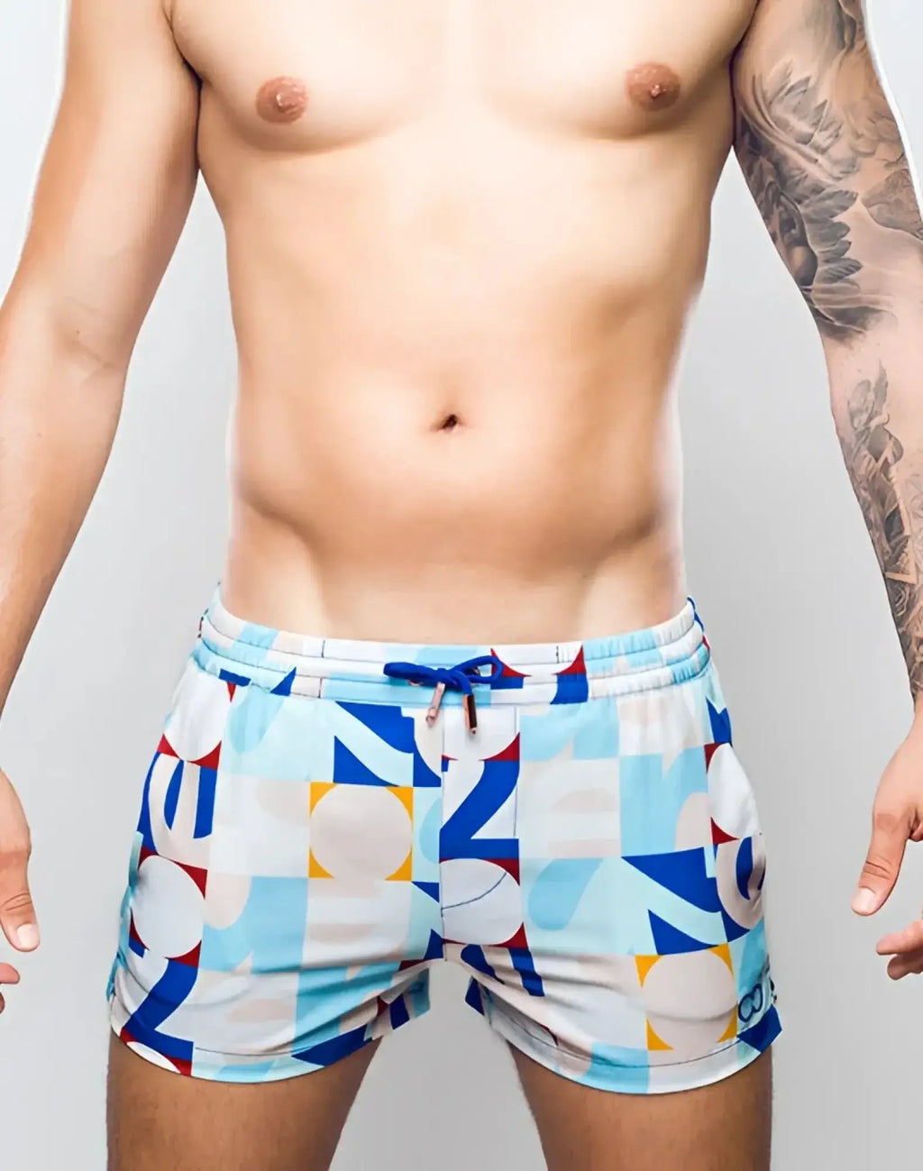 2eros printed bronte shorts in blue and white geometric pattern with a turquoise drawstring waistband