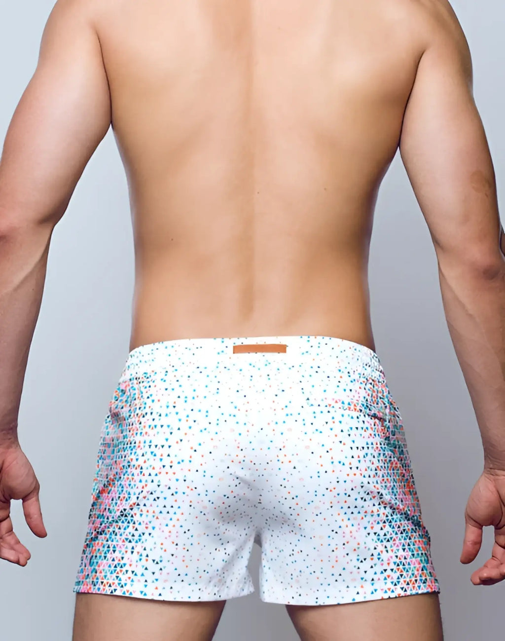 White boxer shorts 2EROS printed Bronte Shorts Moana with vibrant multicolored teal pink and blue triangle pattern