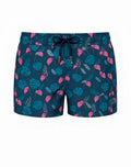 Dark blue 2EROS printed Bronte swim shorts with vibrant pink teal and gray tropical monstera leaf pattern and drawstring waistband