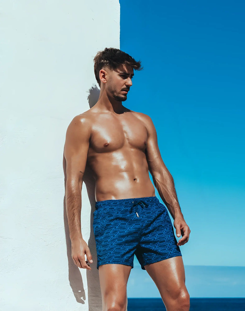 2eros printed bronte shorts in signature navy with blue patterned fabric and a drawstring waistband for swimwear