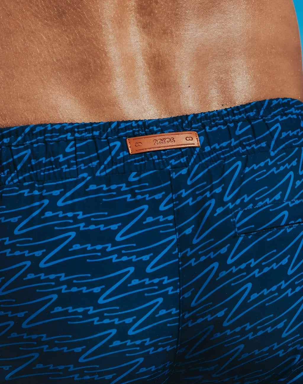 Dark blue 2eros printed bronte shorts with light blue zeros pattern and brown leather brand tag in signature navy color