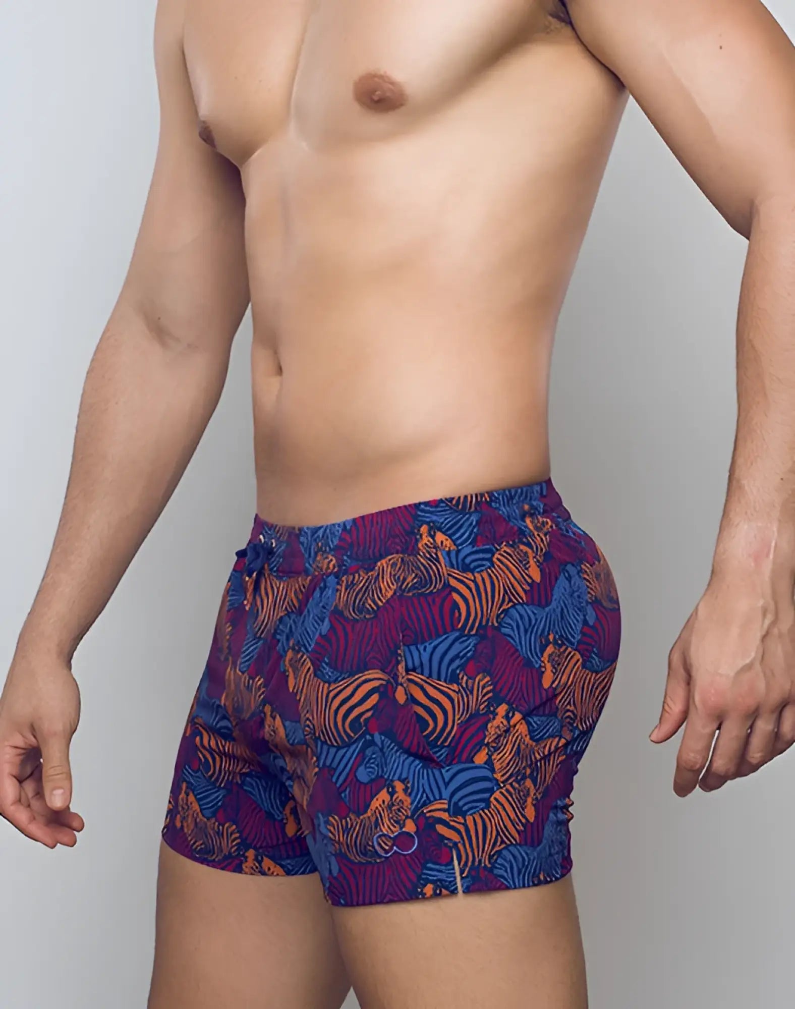 Vibrant purple and blue 2EROS printed Bronte shorts with bold orange-striped zebras in stallion navy design