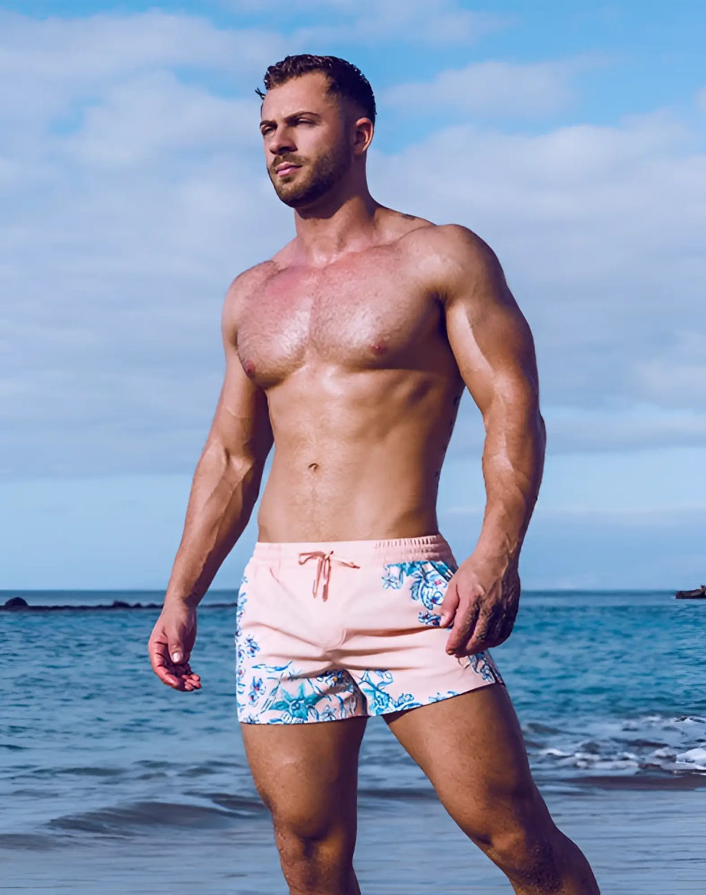 Pink swim trunks with blue floral pattern and matching drawstring 2EROS printed Bronte shorts Tahiti peach