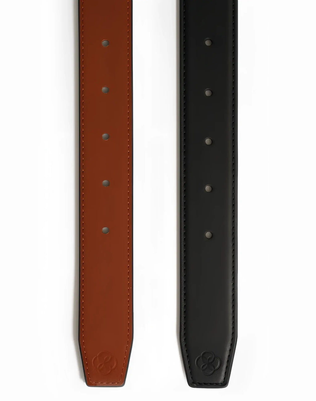 Two 2EROS reversible leather belts in black and rich brown with subtle edge stitching for versatile style
