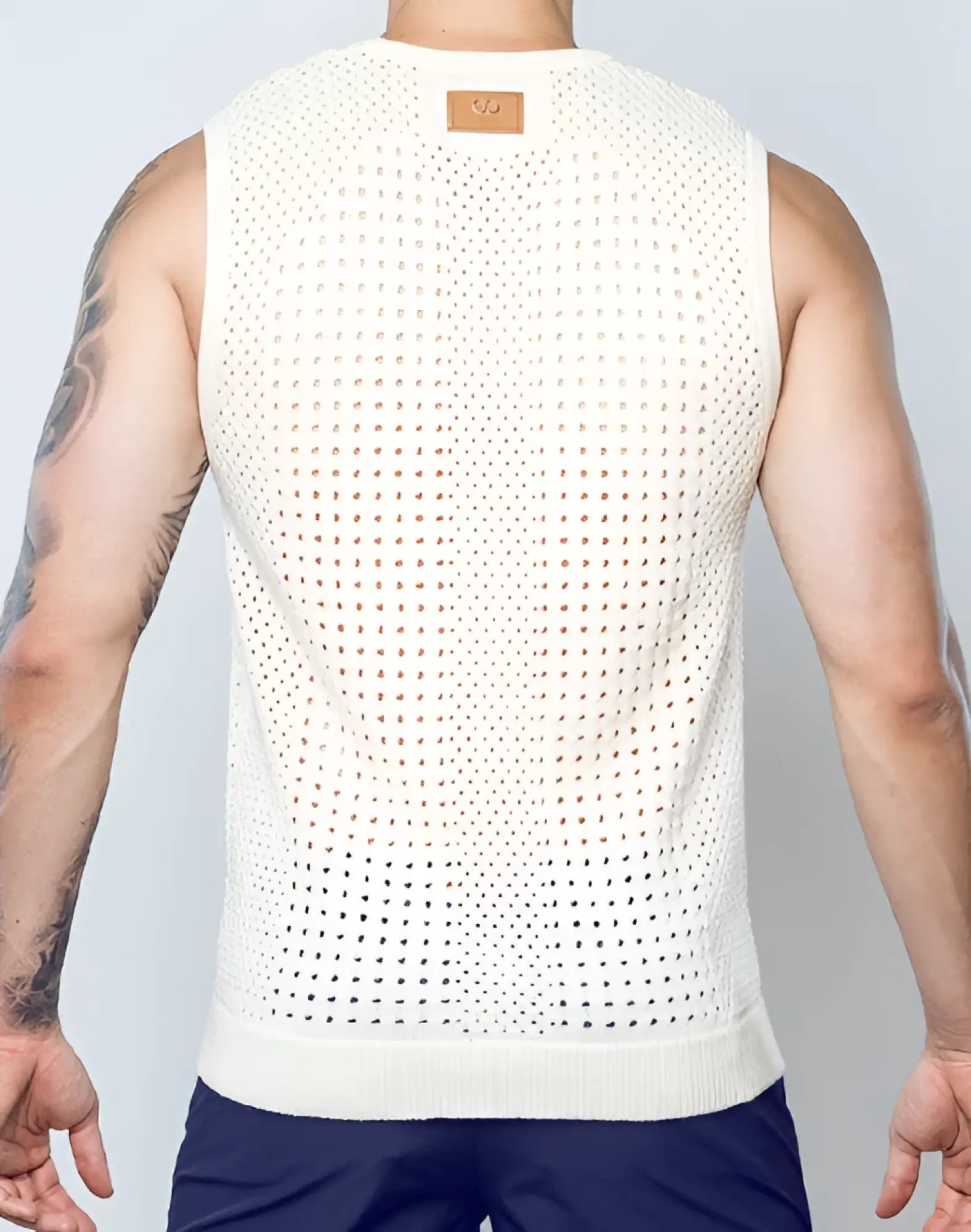 White perforated knit sleeveless top with ribbed hem and leather patch at neckline 2EROS Riviera Singlet beige