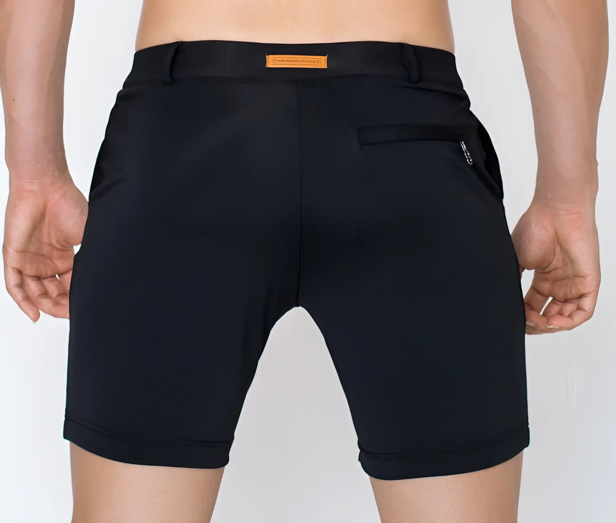 2eros s61 long bondi black athletic shorts with sleek form-fitting design and orange brand tag at waistband