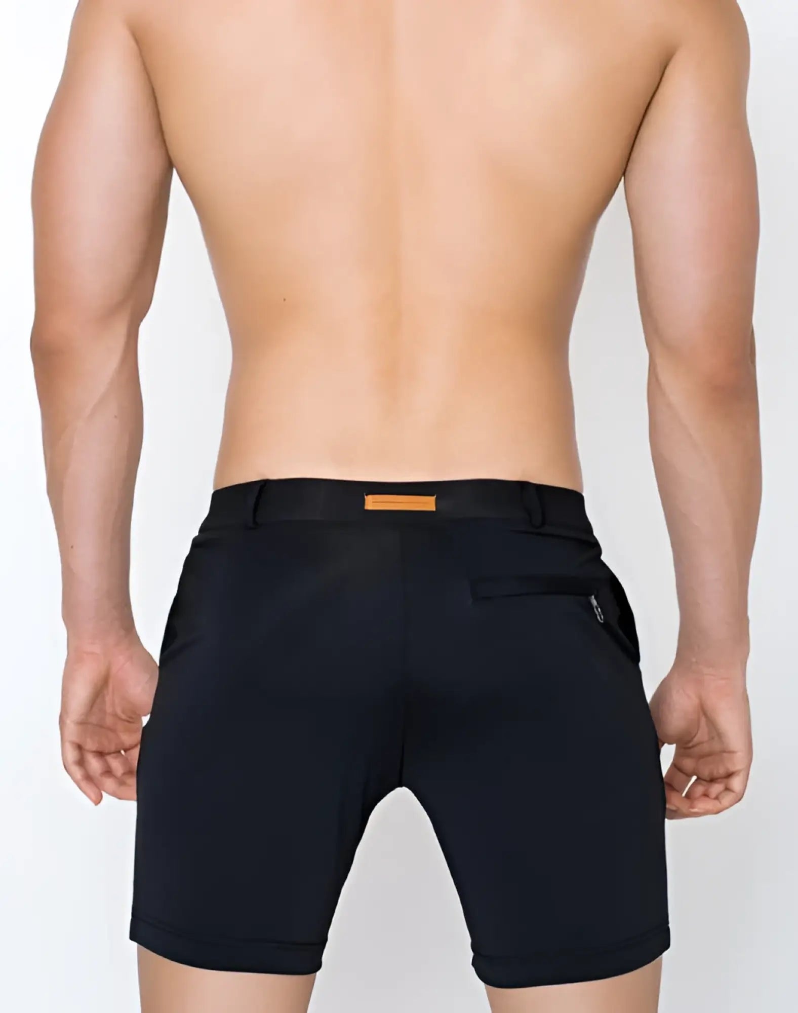 Black 2EROS S61 long Bondi athletic shorts with subtle orange belt loop and zippered side pockets for active wear