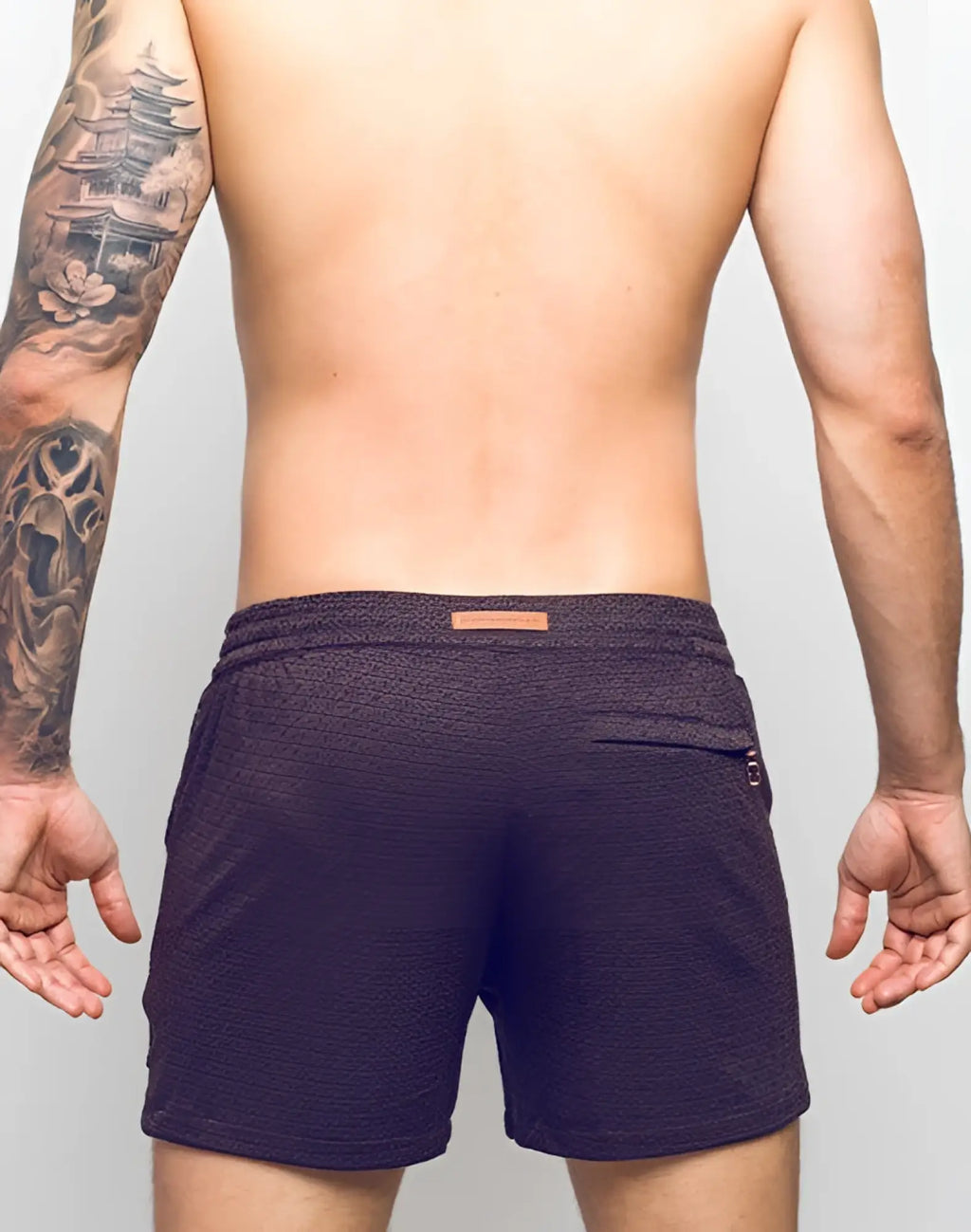 Dark purple 2EROS S90 textured manly shorts with subtle pattern and brown leather tag at waistband in signet black