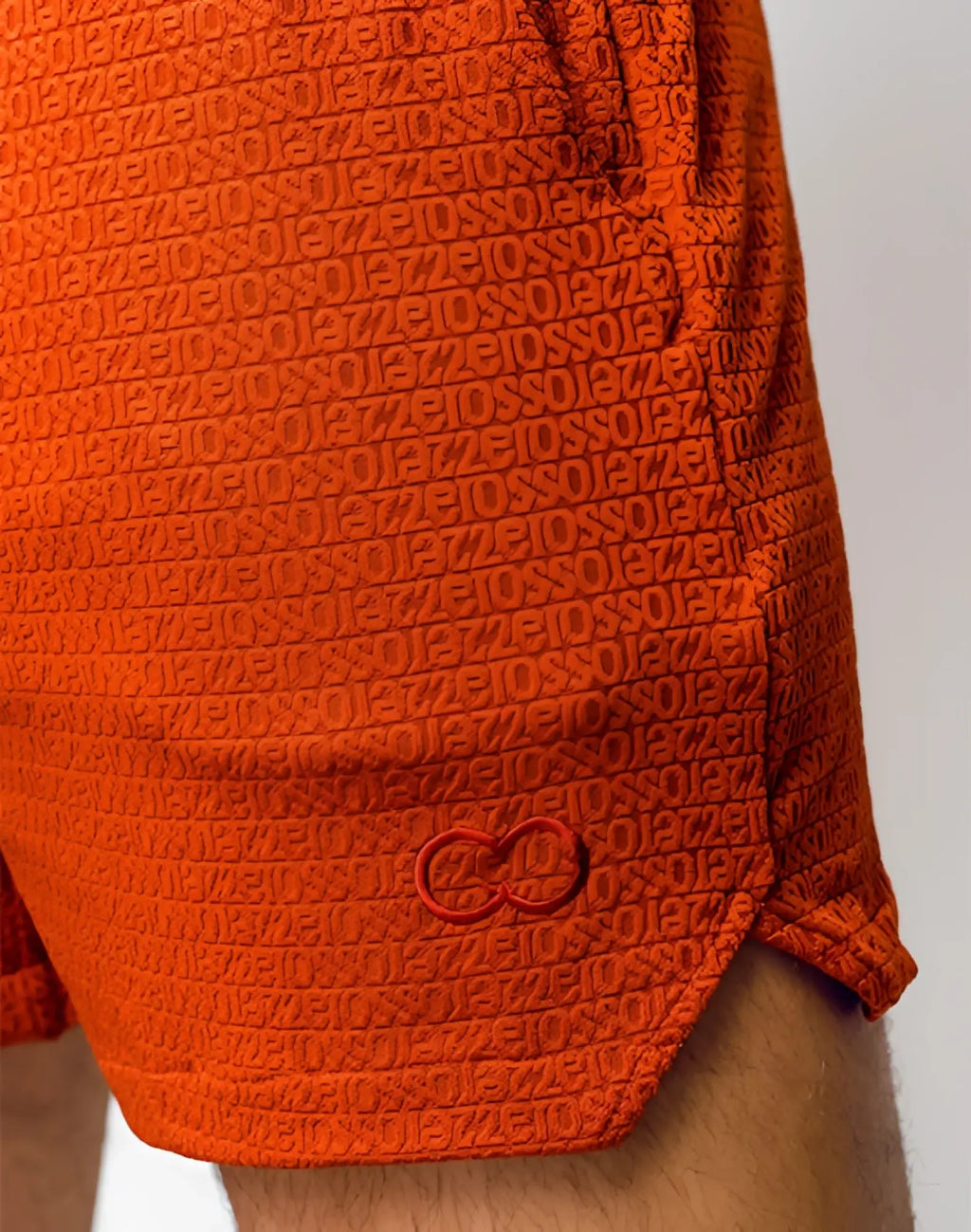 Orange 2eros s90 textured manly shorts with a repeating pattern and embroidered logo on the side