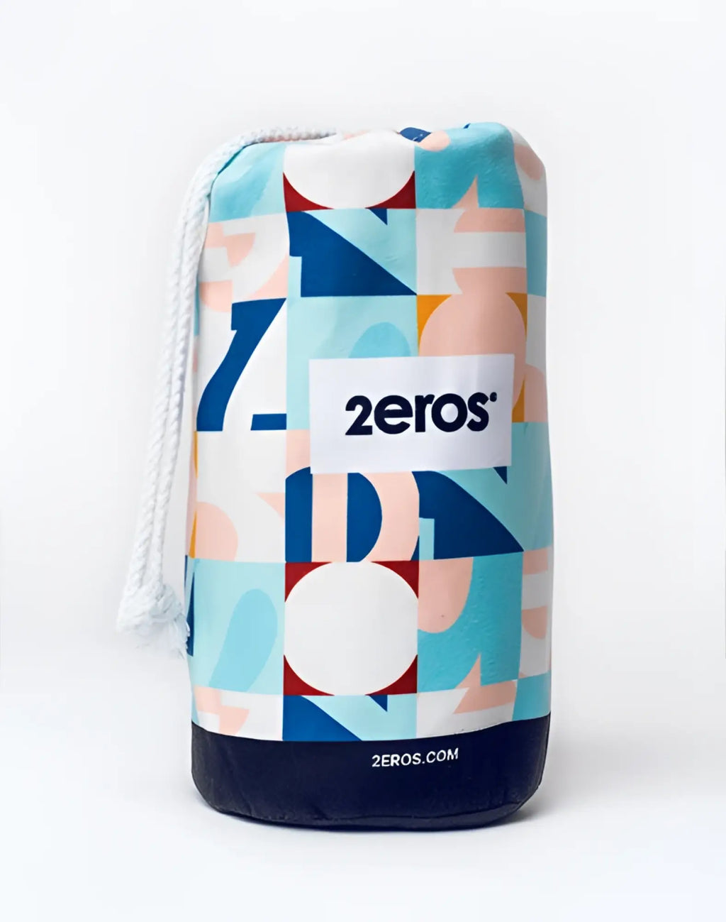 A colorful geometric fabric pouch with white drawstring and navy base featuring 2eros logo for sand-free beach towel