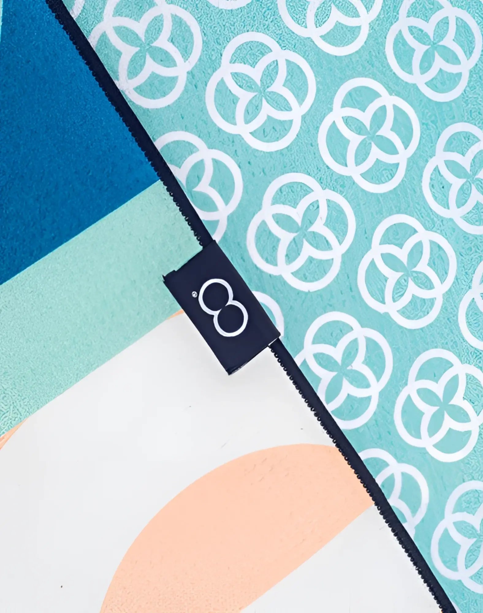 2eros sand-free beach towel insignia turquoise with teal and white geometric microfiber and black zipper trim