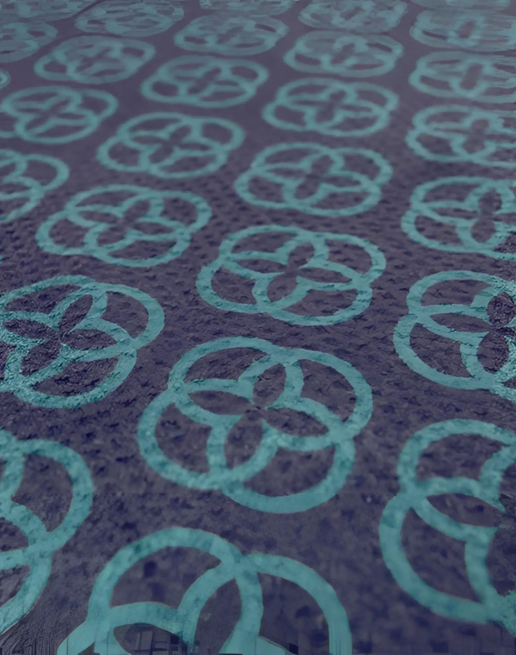 Dark purple 2eros sand free beach towel with teal interlocking quatrefoil pattern named night bloom