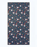 2EROS sand free beach towel night bloom with dense white blossoms green leaves and orange accents on dark teal background